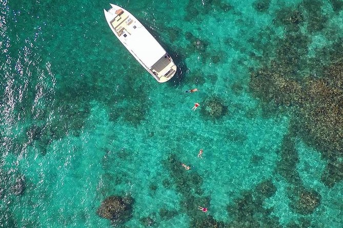 Adventure Antigua - Eli's Original Eco Tour - Getting on the boat in Antigua